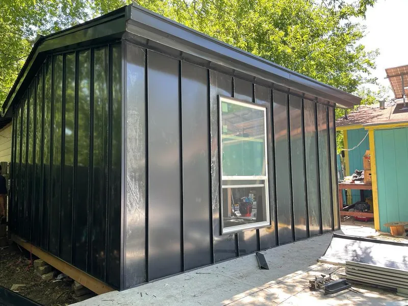 Black standing seam metal wall panels for Metal Roof Installation in Albany