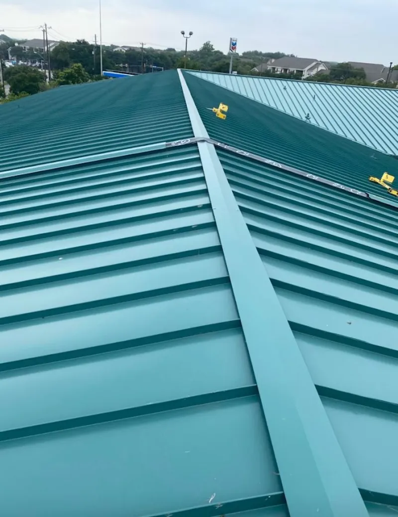 Green commercial metal roof ridge and valley for Metal Roof Repair in Albany